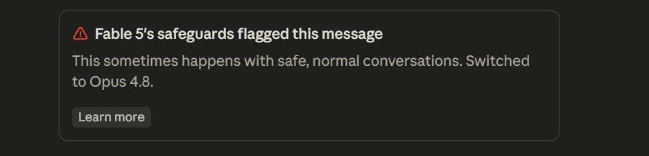 After Fable 5’s safeguard flags a message, the interface says that the session has switched to Opus 4.8.