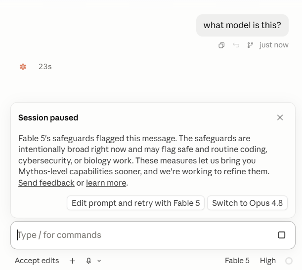 A Fable 5 session is paused by the safeguard after the user asks, “What model is this?”